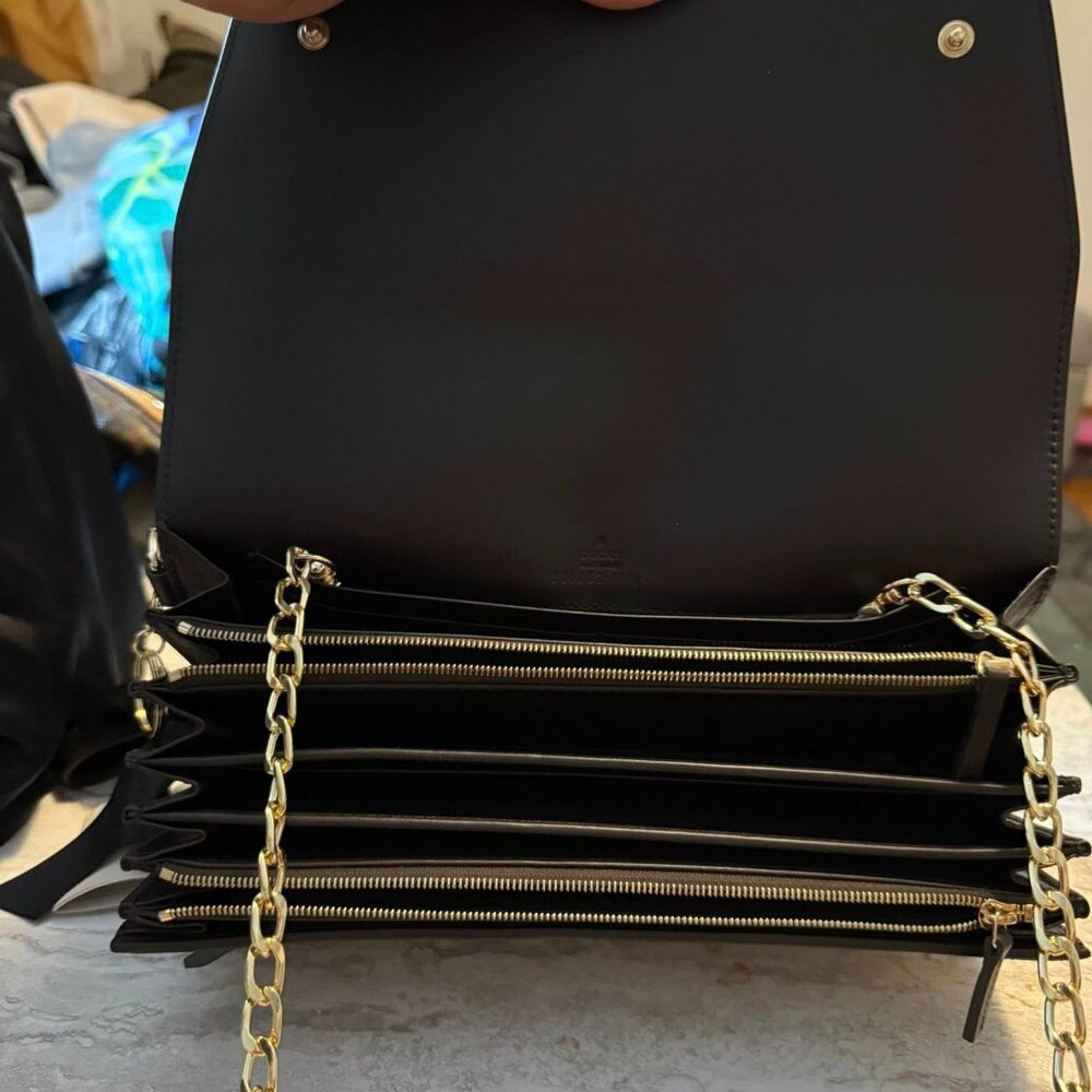 Gucci GG Supreme clutch